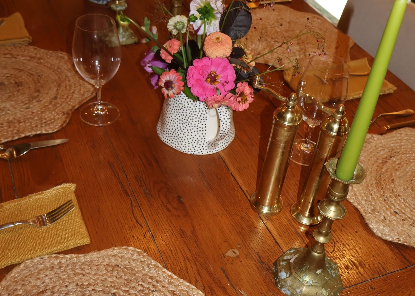 Candles and flowers down the dining table