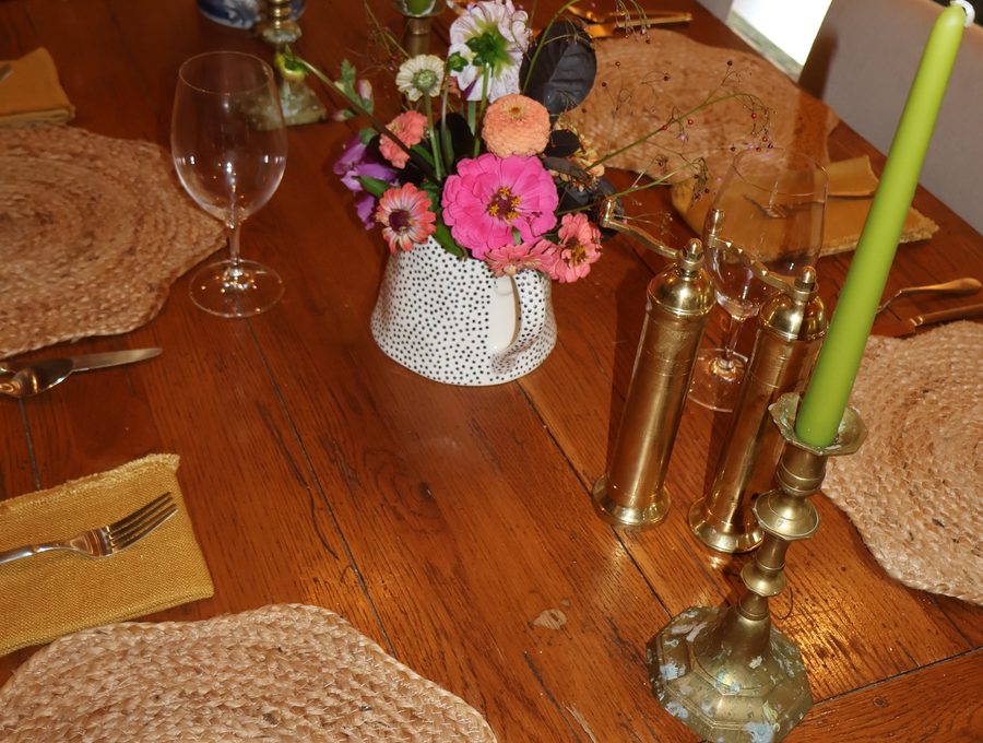 Candles and flowers down the dining table