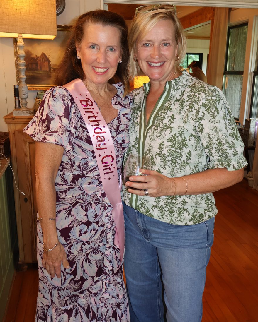 Friends celebrating in the kitchen