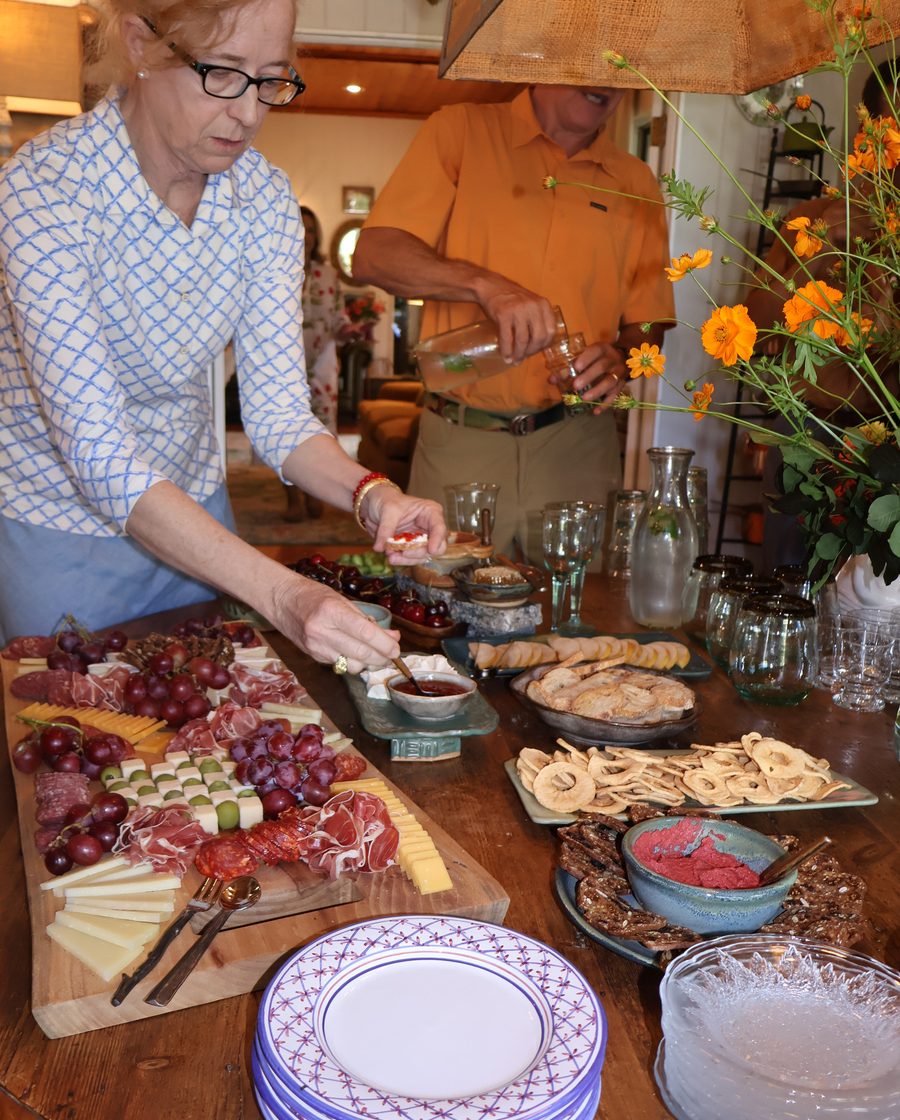 The serving table dressed with flowers