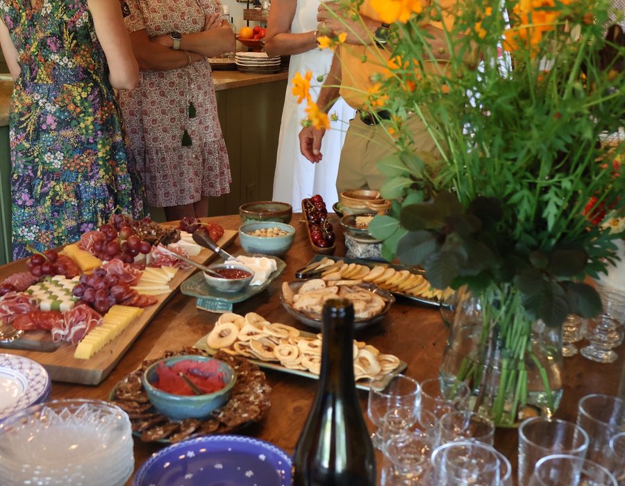The table set with flowers for a summer dinner