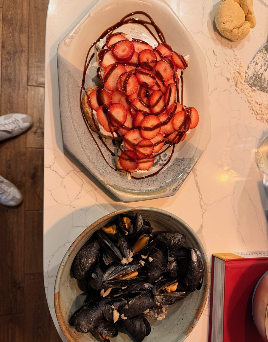 Strawberry tart and a bowl of mussels
